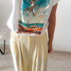 Pantalon femme jaune pastel taille haute à pinces avec t-shirt blanc imprimé palmier style Miami